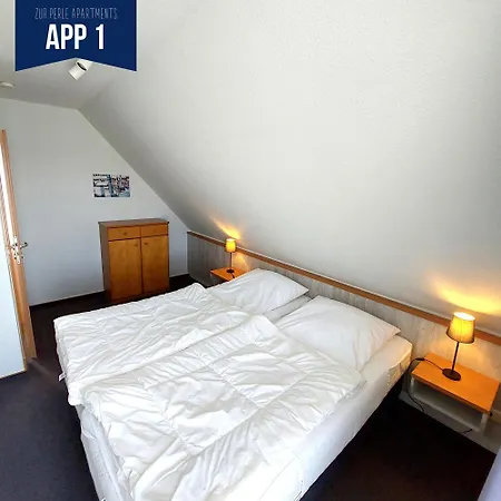 Zur Perle Апартаменты Бюзум