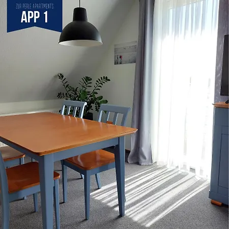 Zur Perle Апартаменты Бюзум